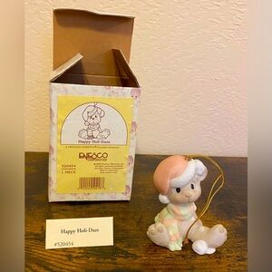 Artwork by the late Sam Butcher. Precious Moments 1998 Ornament.